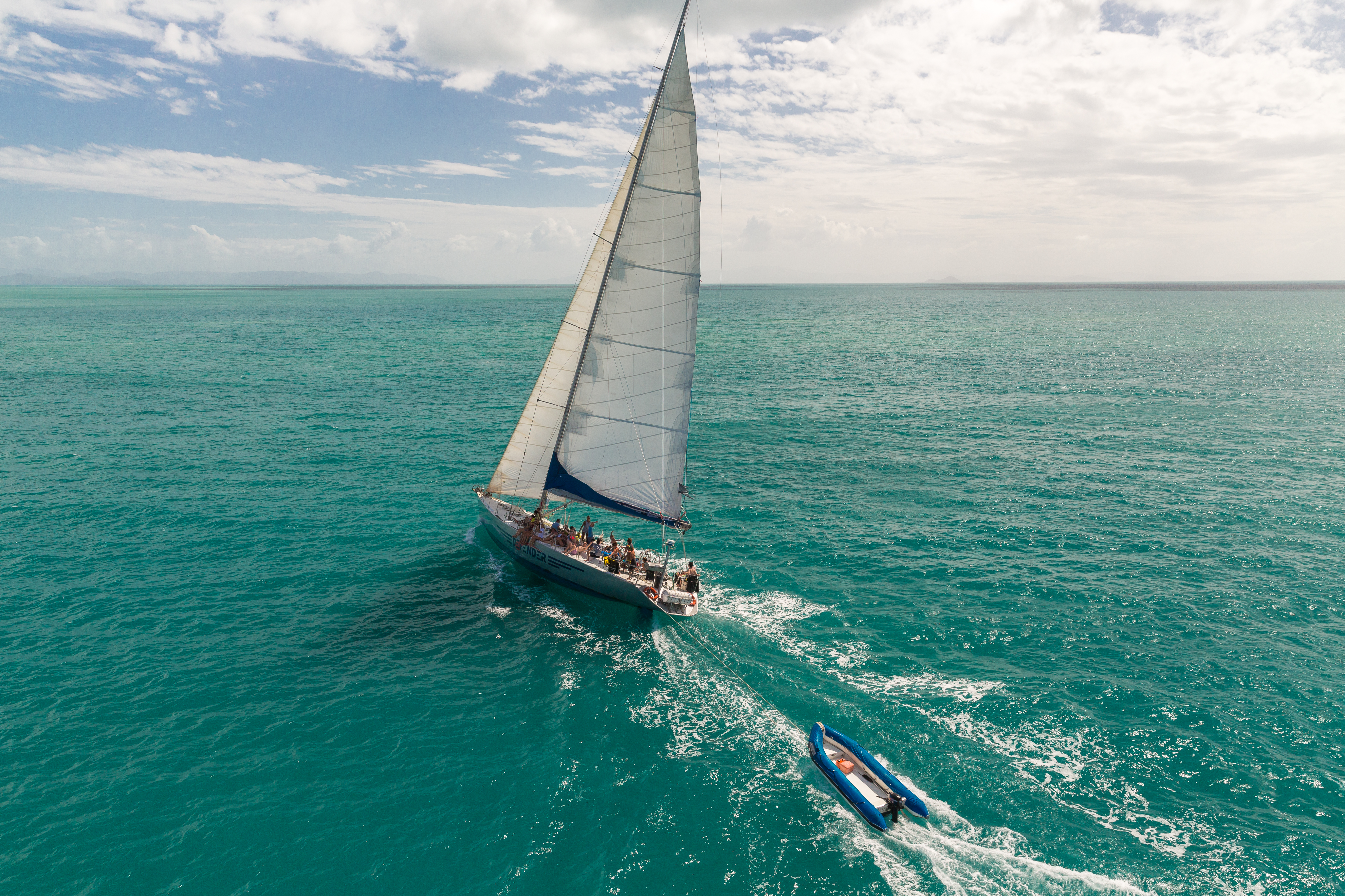 British Defender - Aerial Sailing from Stern - Explore Whitsundays.jpg